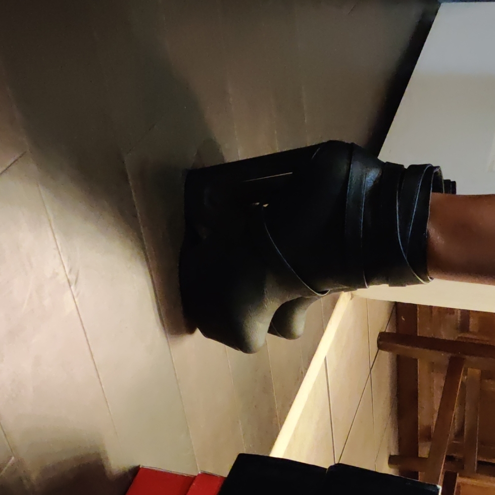 Black leather heeled boots